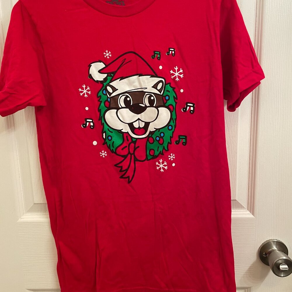Buc-ee's Holiday Tee It's Not About What's Under The Tree It's About Who's Small